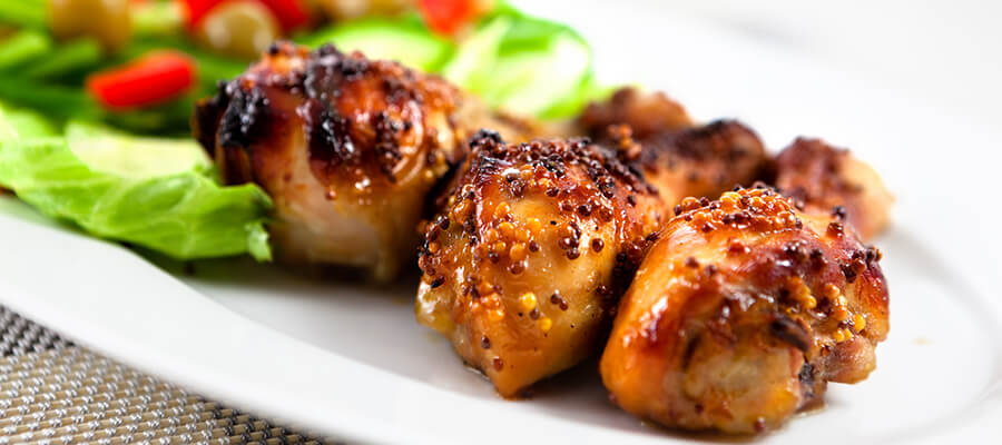 Muslos de pollo con miel y mostaza
