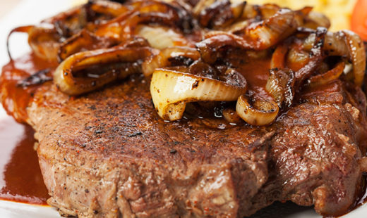 Porterhouse with Onion and Portobello Mushroom